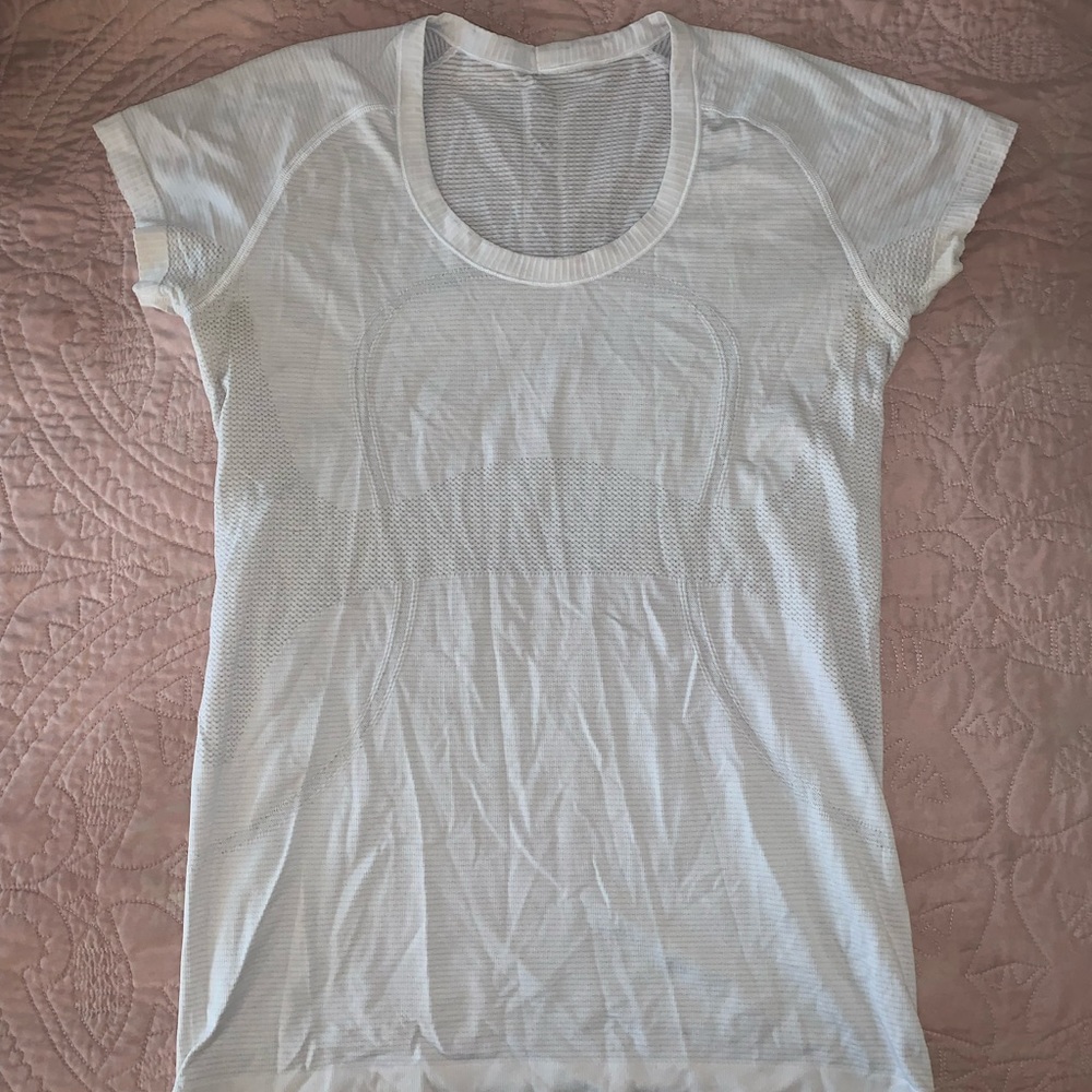 Lululemon white short sleeve athletic top. Size 10.
